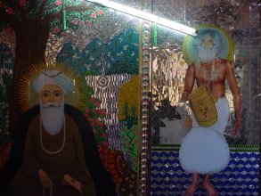 Image of Jeejal Ram with images of Sikh Gurus