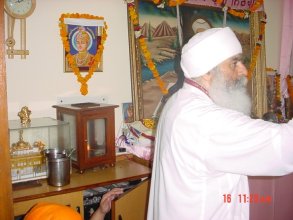 Home of Chaman Lal, see idol of Ganesh on top of Harmandir Sahib Model