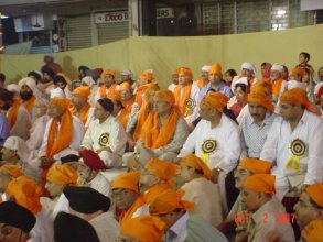 Prerna 2007, people sitting on chairs in presence of Guru Granth Sahib Ji