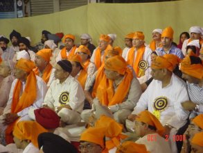 Prerna 2007, people sitting on chairs in presence of Guru Granth Sahib Ji