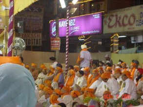 Prerna 2007, people sitting on chairs in presence of Guru Granth Sahib Ji