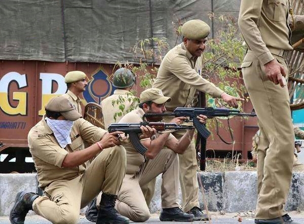 A still-frame of a video seconds before Jagjit Singh was shot by the above police officers.